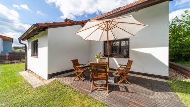 Malebný dům s příjemnou zahradou v atraktivní lokalitě.